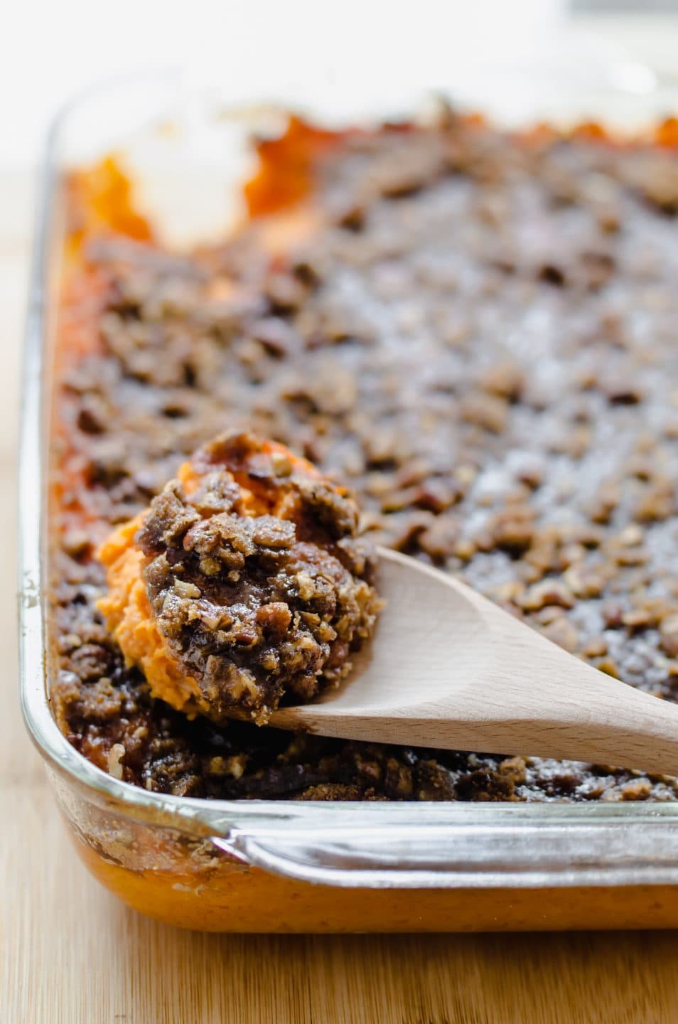A close up shot of the pecan streusel topping on a sweet potato casserole. 