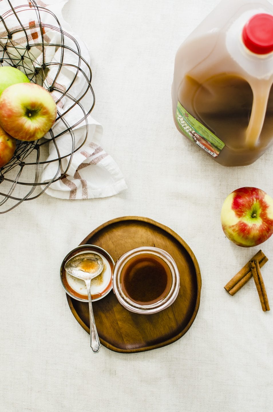 An overhead shot of ingredients used to make boiled apple cider syrup. 