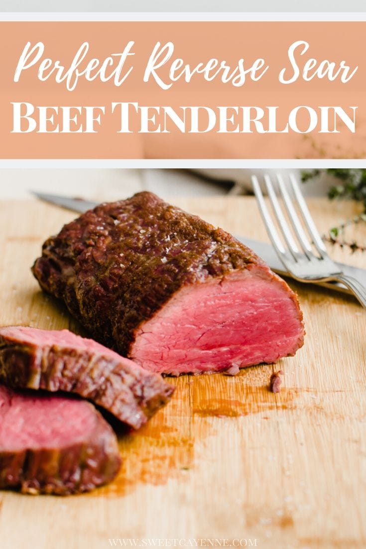 A beef tenderloin being sliced on a cutting board.