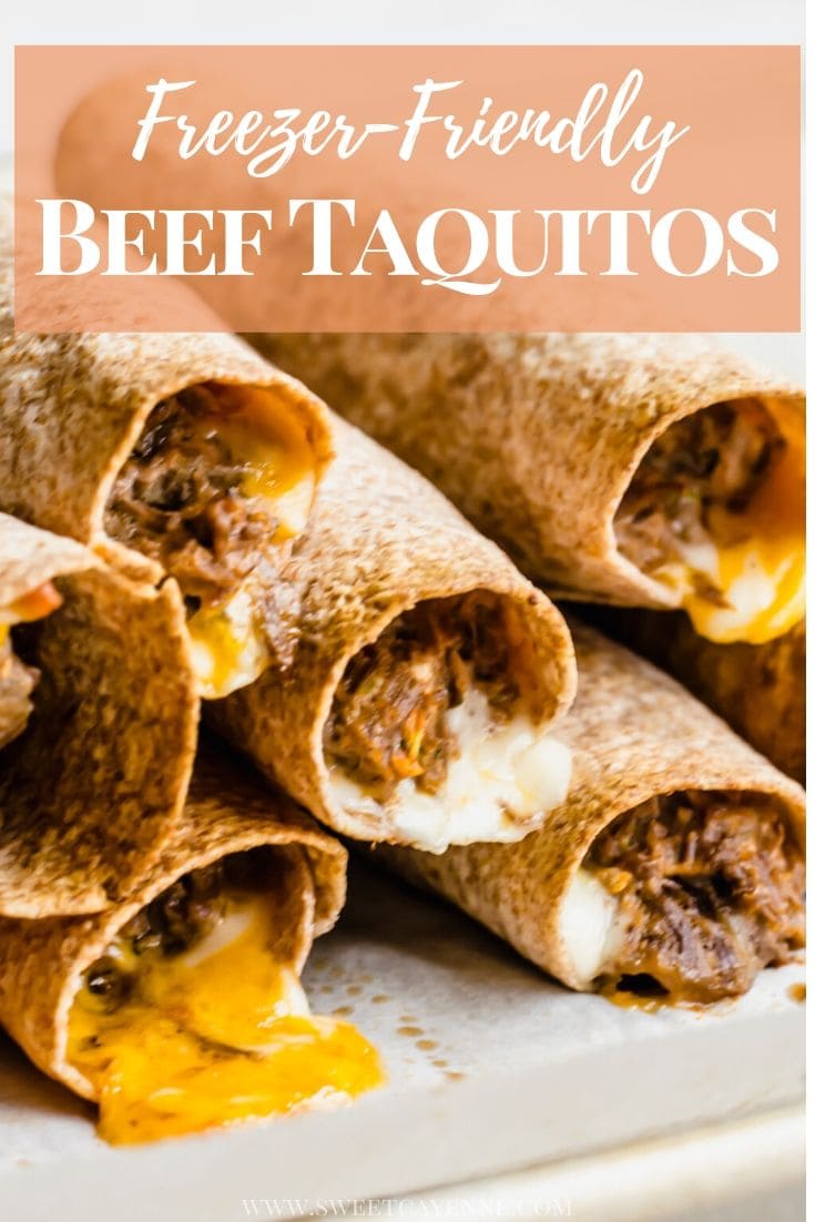 Stacked shredded beef taquitos on a sheet pan.